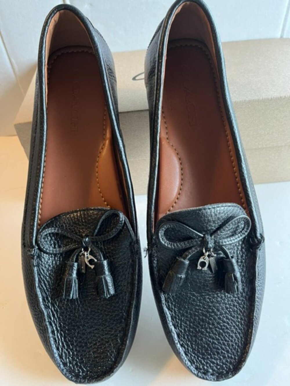 Coach Greenwich pebble-grain leather loafers.